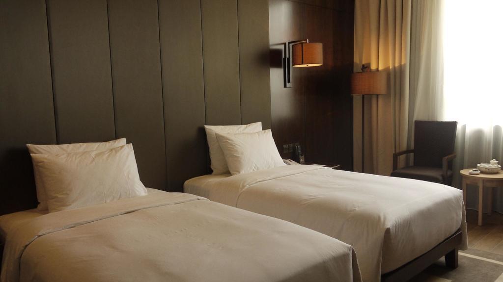 XI Yu Hotel Kanton Zimmer foto