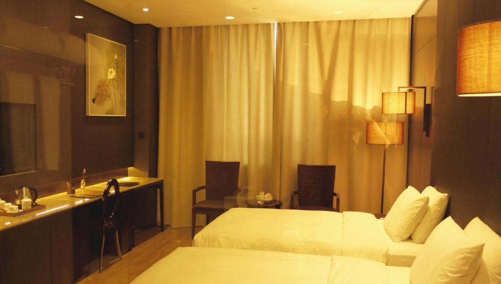XI Yu Hotel Kanton Zimmer foto